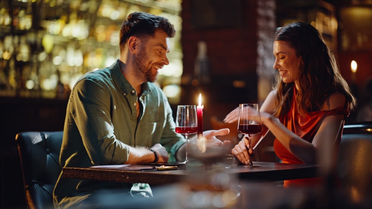 Romantic dinner setting with candlelight and flowers - numerology first dates