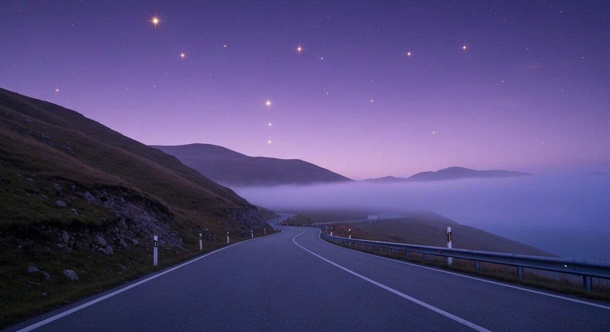 Winding mountain road at purple twilight hour. Winding mountain road at purple twilight hour.