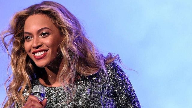 Beyonce Knowles in Sequin Dress On Stage Head Shot